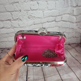 Skulls and roses wedding clutch bag